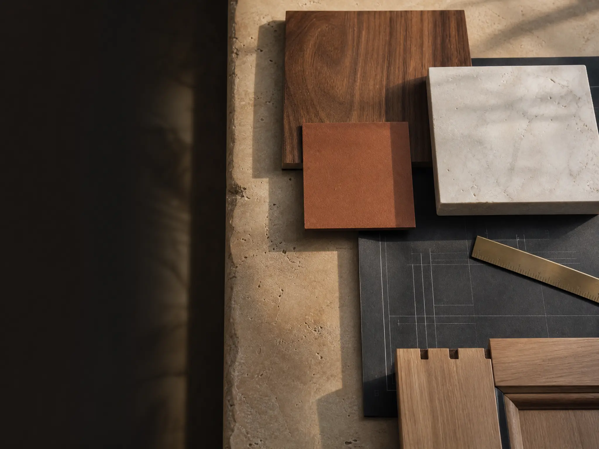 Conceptual remodeling material board with walnut, stone, and metal finishes