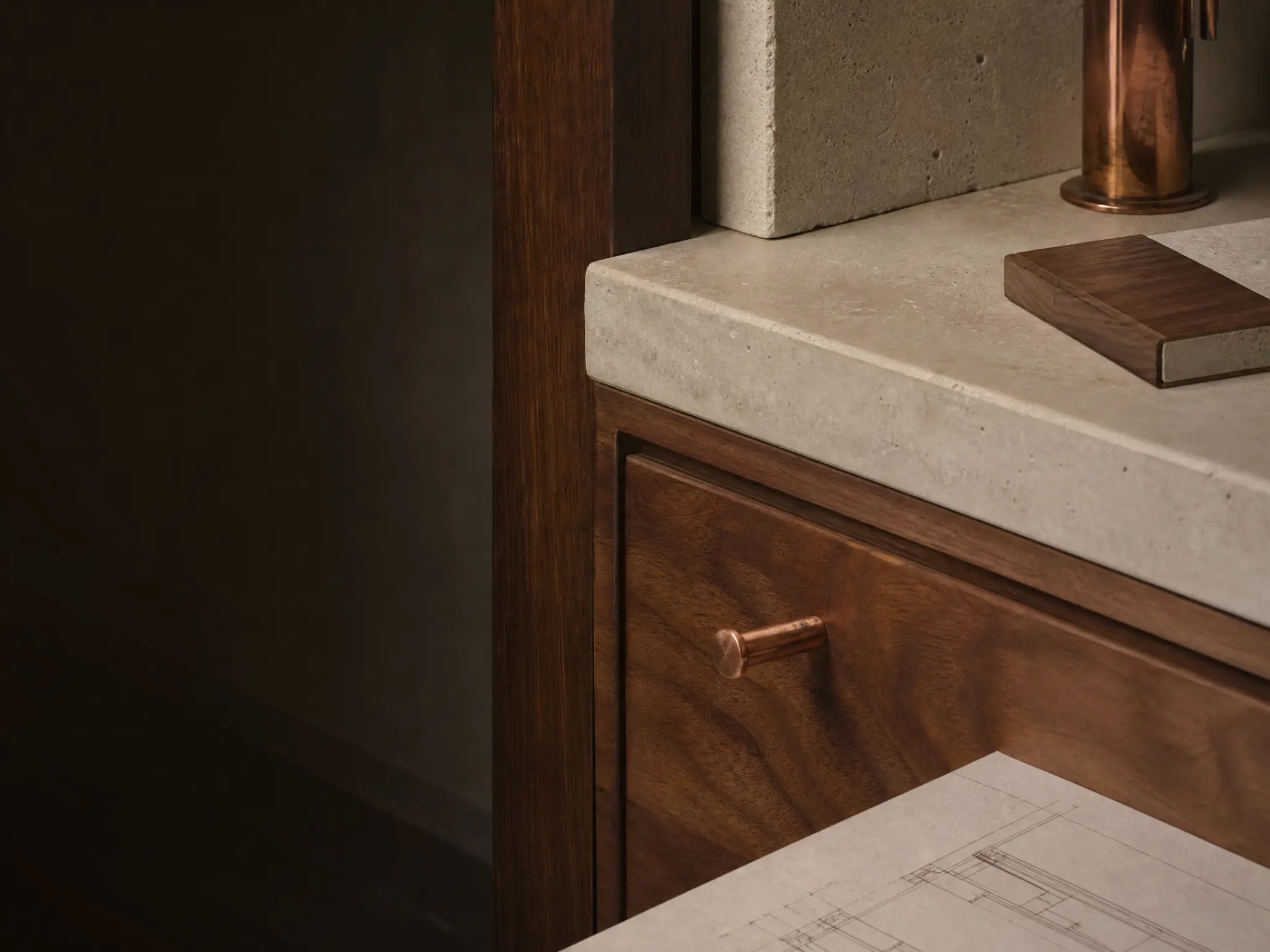 Conceptual renovation planning board with stone, walnut, and copper materials
